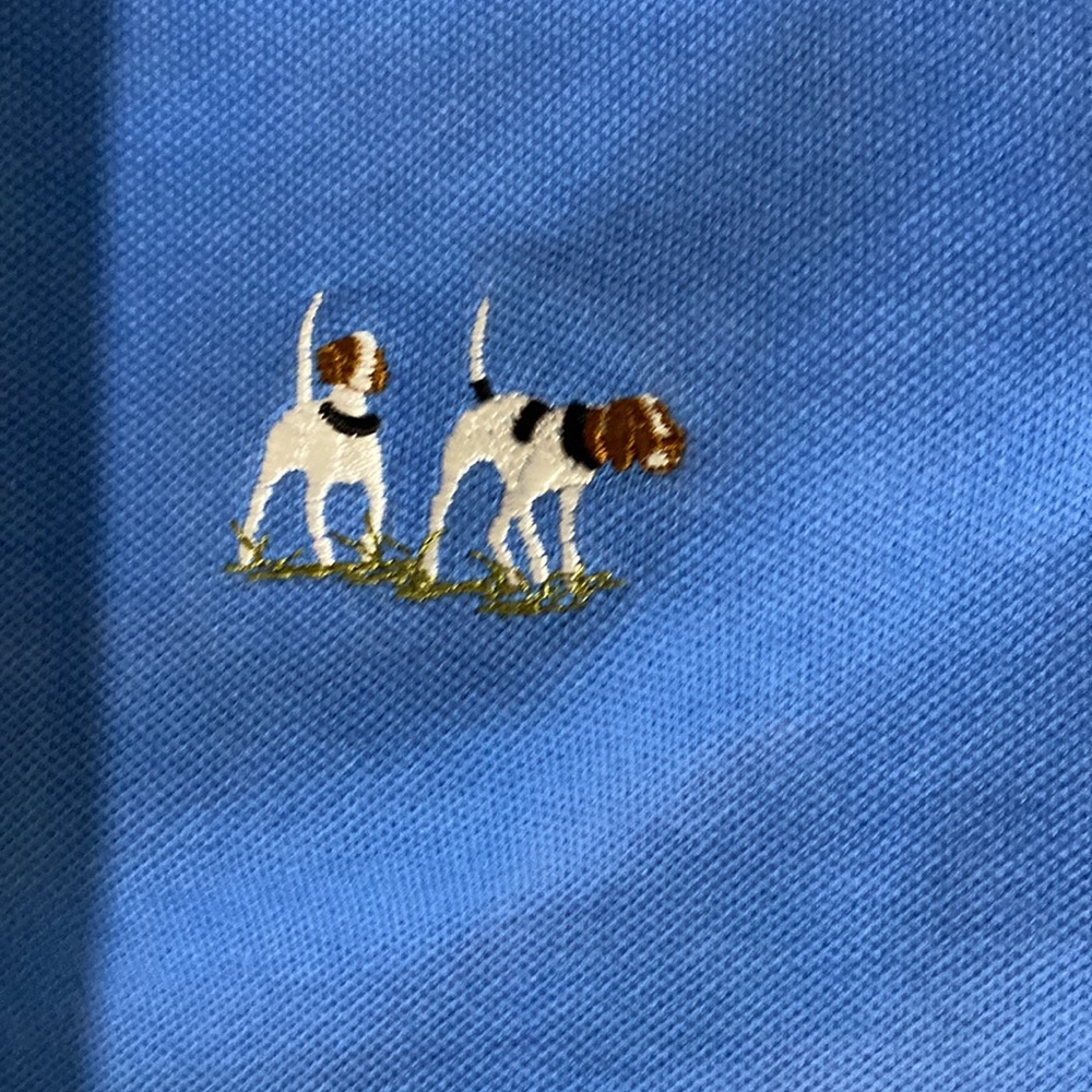 Al Dixon’s polo shirt